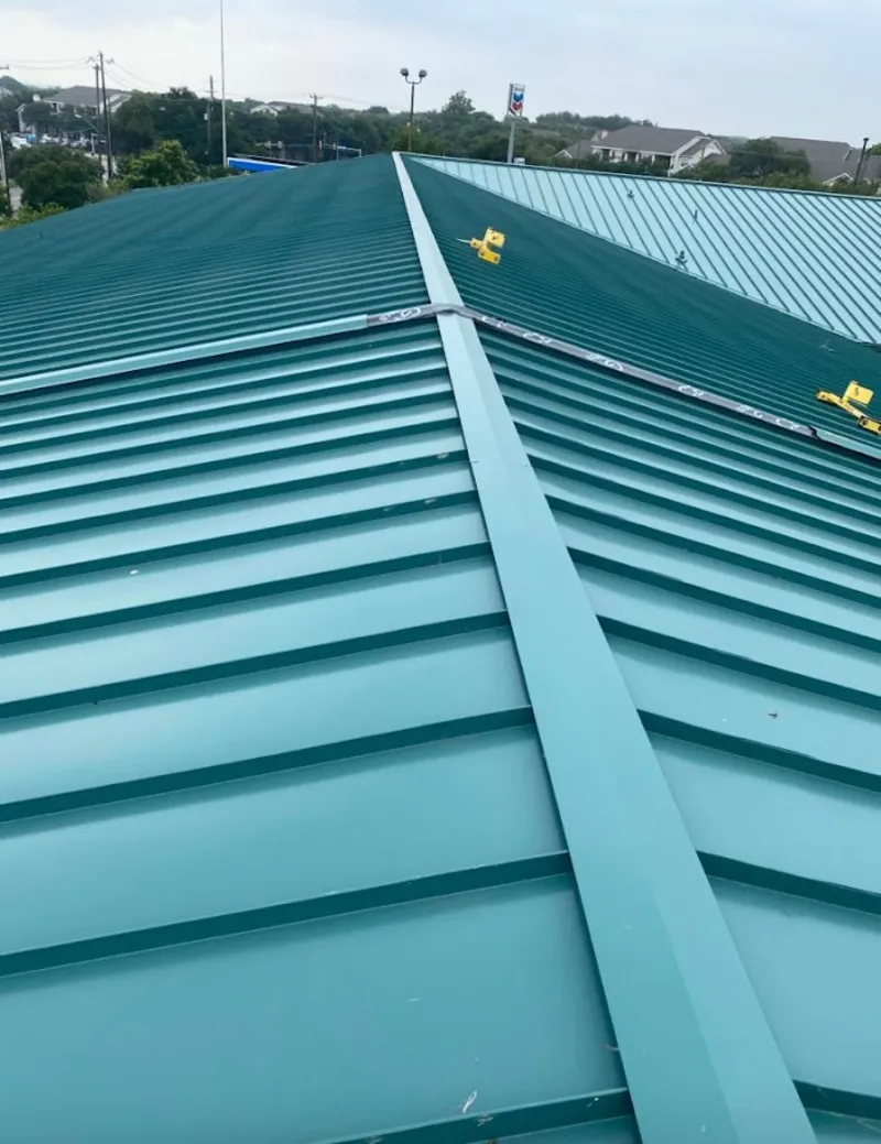 Green commercial metal roof ridge and valley for Metal Roof Repair in Madera